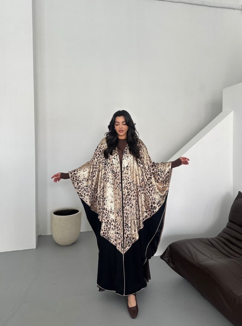 Elevate your wardrobe with our Limited Collection Shimmer Leopard Black Abaya !Crafted with a shimmering fabric et
This perfect for any occasion, and will add a touch of elegance to your look. Don't miss out!